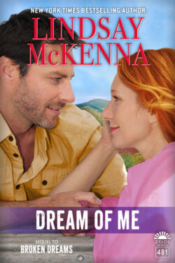 Book cover for Dream of Me, book 4B1 of the Delos series by Lindsay McKenna, featuring dark haired man in khaki shirt staring into the eyes of red haired woman in pink blouse in front of a blue sky with mountains in the background.